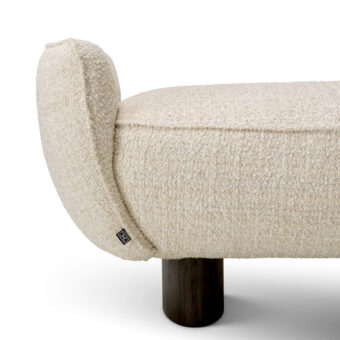Bench by Eichholtz in neutral off-white Winslow chenille upholstery with a thick cushioned seat and charcoal leg finish