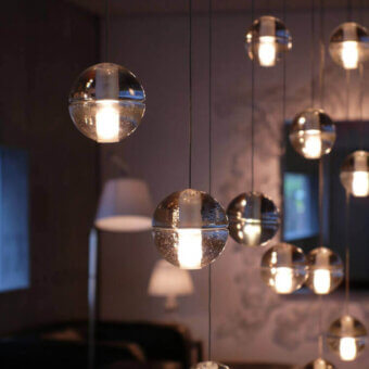 Distinguished Bocci 14 Random Suspension lamp with articulated cast glass spheres and clear-to-metallic silver finish delivering diffused light