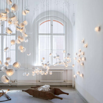 Exceptional Bocci 76 Single Suspension Lamp with hot white and clear glass plus delicate copper mesh detailing