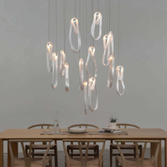 Luxury Bocci 87 Random suspension lamp crafted in pale gray glass with satin metal rods and gentle illumination