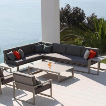 Exceptional Royal Botania Ninix lounge sectional with stainless steel frame and comfortable Batyline seat in shades of grey and orange