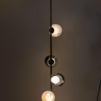 Superior Bocci 28 Stem Floor Lamp with a slender metal stem and distorted clear glass spheres in brushed brass finish