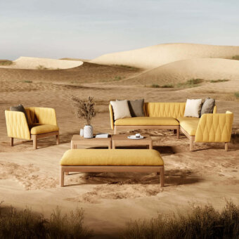 Distinguished Royal Botania Calypso Lounge sectional with teak base and comfortably padded cushions in golden yellow woven fabric with stainless steel accents