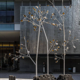 Exceptional Bocci 16 Tree floor lamp with translucent amber glass leaves and polished metal stem