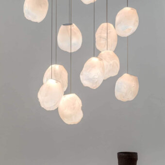 Elegant Bocci 73V suspension lamp with translucent white glass and refined braided metal coaxial cable