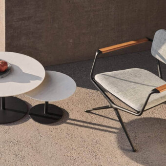 Elegant Royal Botania Butler side table with layered effect and matte black coated stainless steel base