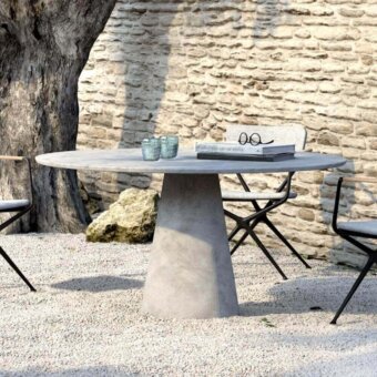Innovative Royal Botania Conix table with conical base cast in fiber-reinforced Ductal® concrete and polished matte gray top