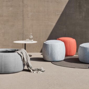 Innovative Royal Botania Tono ottoman in light gray textile with textured matte finish offers storage or planter use