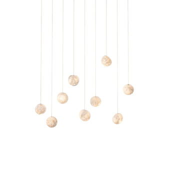 Exceptional Bocci 118 Linear Suspension Lamp with nine hand-blown glass pendants exhibiting a warm pale gold tone and translucent texture