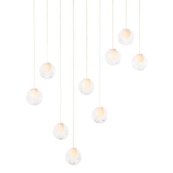 Captivating Bocci 28 Linear suspension lamp crafted in clear glass with milk white interior lamp holder cavities and light-colored cables