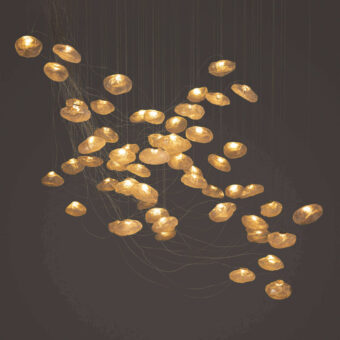 Superior Bocci 73 sculptural cable suspension lamp with warm golden amber blown glass and brushed nickel canopy