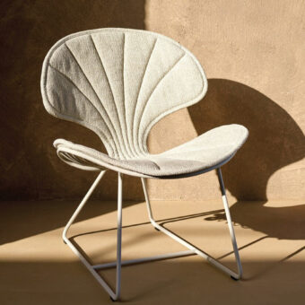 Exceptional Royal Botania Ostrea lounge chair with white coated stainless-steel structure and textured neutral cushion