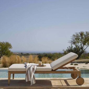 Exceptional Royal Botania Zenhit lounger built with teak wood and light gray textile upholstery for comfortable relaxation