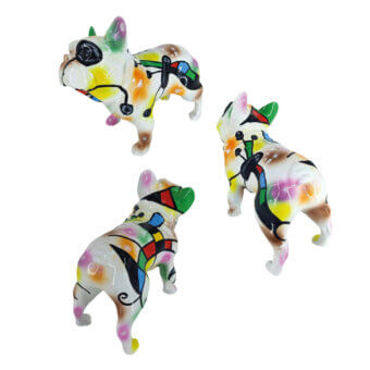 Juliarte French bulldog sculptures, ceramic, cubist style; yellow, orange, green, black, and white fragmented design, asymmetrical poses.