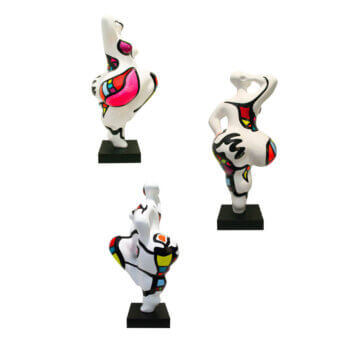 Juliarte sculptures, white serenity finish, abstract human figures with cubist black, red, yellow, and green geometric patterns on black pedestals.