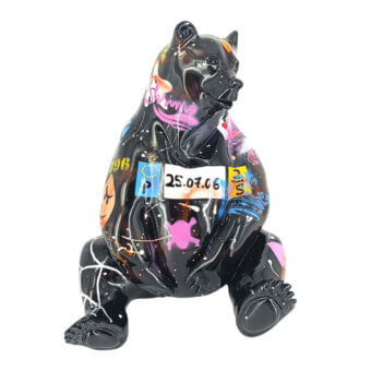 Black bear sculpture with glossy graffiti design, featuring pink, yellow, orange, purple, and white star patterns, Juliarte style.