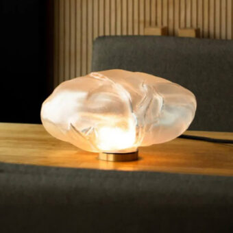 Exquisite Bocci 73 table lamp with organic asymmetrical glass diffuser and polished gold cylindrical base
