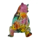 Sculpture of seated bear by Juliarte, glossy multi-colored resin, swirling pink, yellow, green, blue hues with graffiti text details.