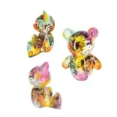 Juliarte teddy sculptures, glossy finish, motorsport theme; green/blue, checkered, pink/purple, pink/yellow collage designs on white background.