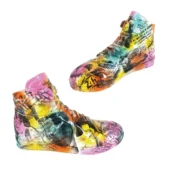 Resin sneaker sculptures, “24h Le Mans Finish” by Juliarte, display layered racing imagery, text collage, pink & purple gradient soles, white background.