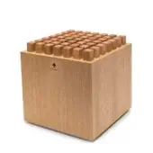 Wooden box with grid of rectangular blocks, light wood grain, dark triangular arrow, and "NOHRD" text on white background.