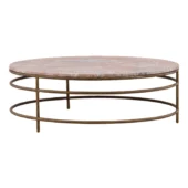 Coffee table by Dovetail with a pinkish-brown marble top and an antique brass metal base featuring concentric ring forms
