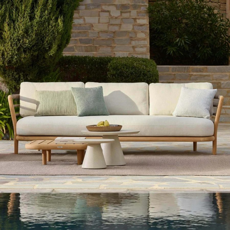 Luxury Royal Botania Archy outdoor sectional with solid teak frame warm natural finish and soft off‑white upholstered cushions