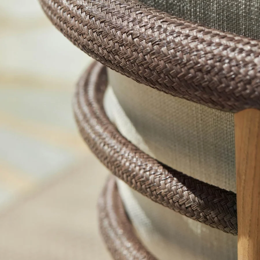 Sophisticated sculptural Royal Botania Archy sofa with brown taupe woven bands, light beige cushions and natural teak finish