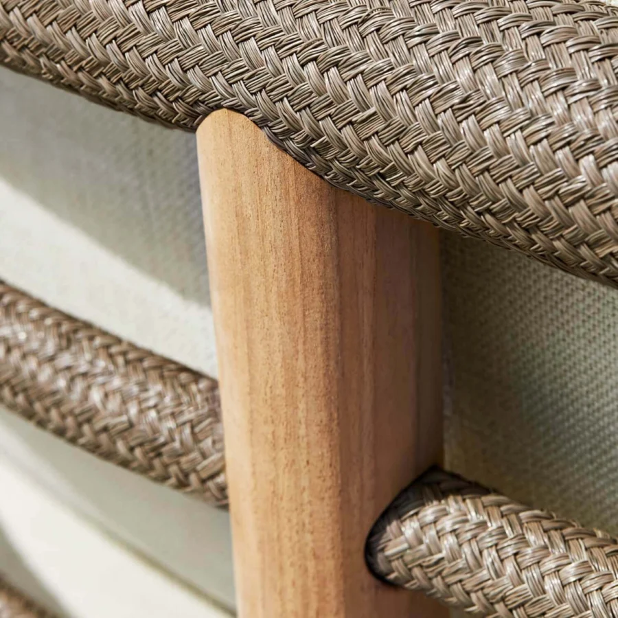 Daybed by Royal Botania featuring solid teak wood with matte natural finish, taupe synthetic supports and fabric upholstery