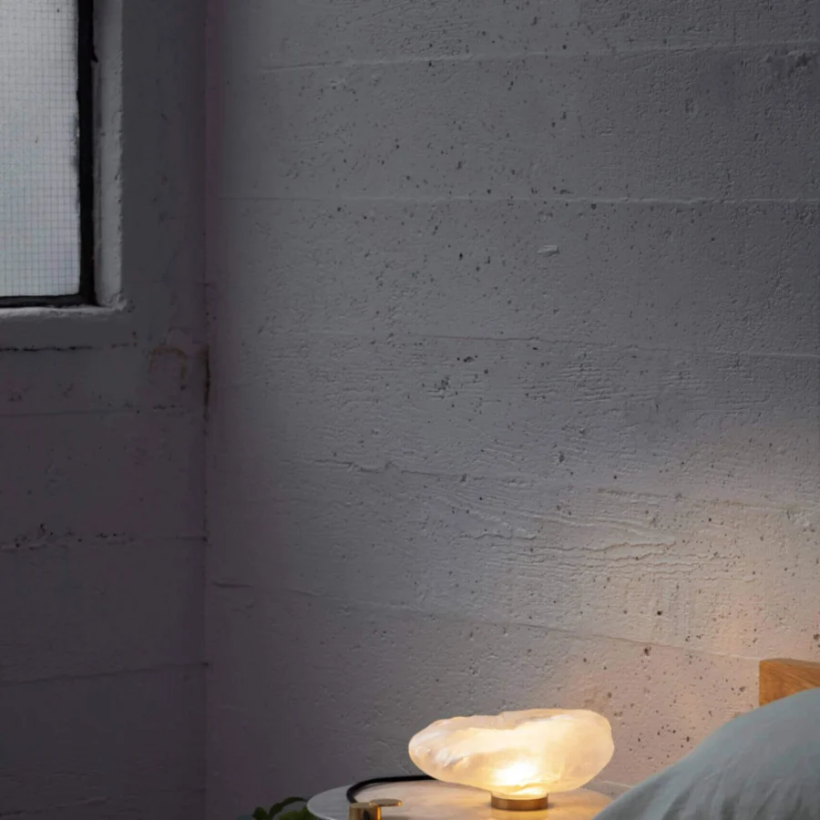 Lamp by Bocci with frosted glass diffuser and cylindrical brushed metal base