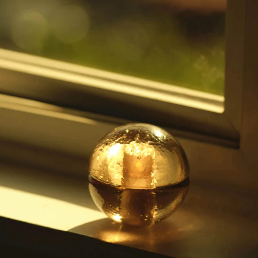 Lamp by Bocci in glass with frosted cavity and hammered texture finish