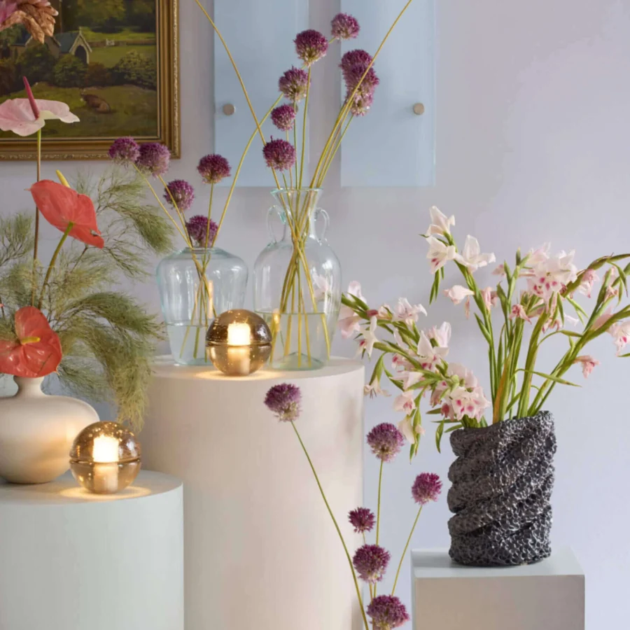 Lamps by Bocci in spherical glass with frosted interior cavities and glossy speckled amber brown finish for cordless use
