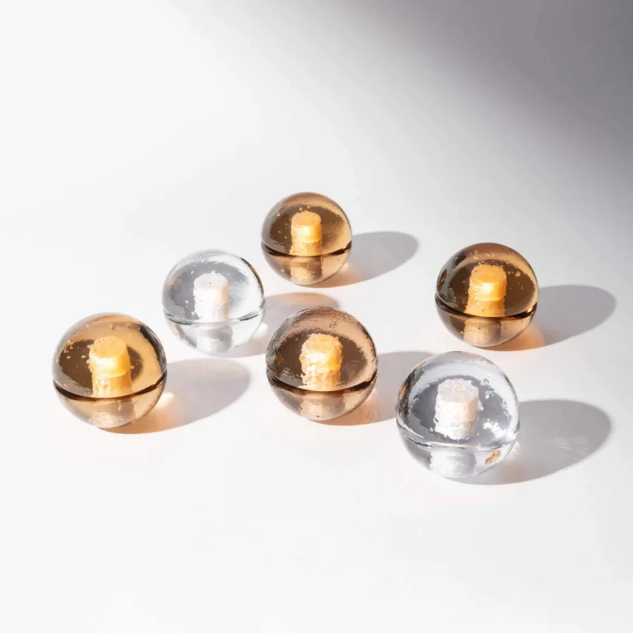 Lamp set by Bocci in amber and clear glass with glossy finish, featuring spherical cordless portable fixtures