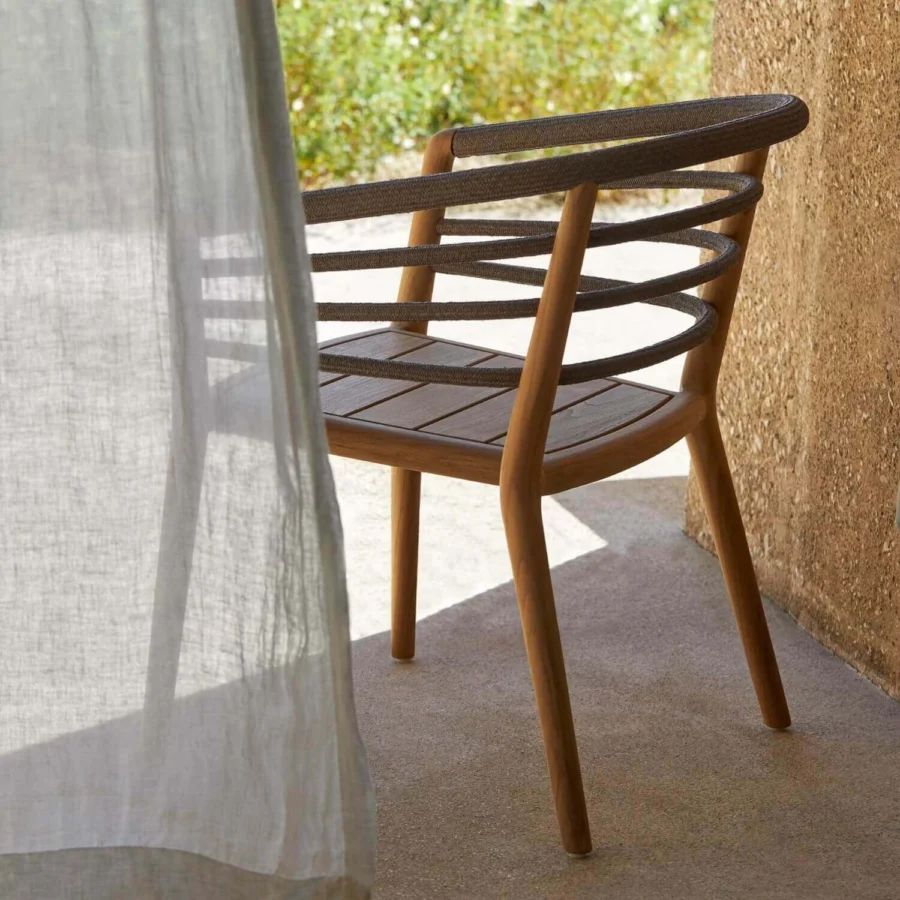 Armchair by Royal Botania in teak wood with matte finish and slatted seat plus dark taupe woven rope cords on…