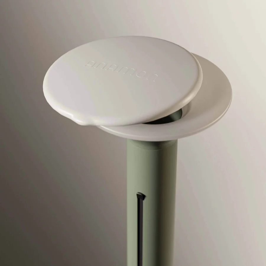 Distinguished Royal Botania Anamon sunshade crafted with matte synthetic material in sage green and a light grey-white disc with logo
