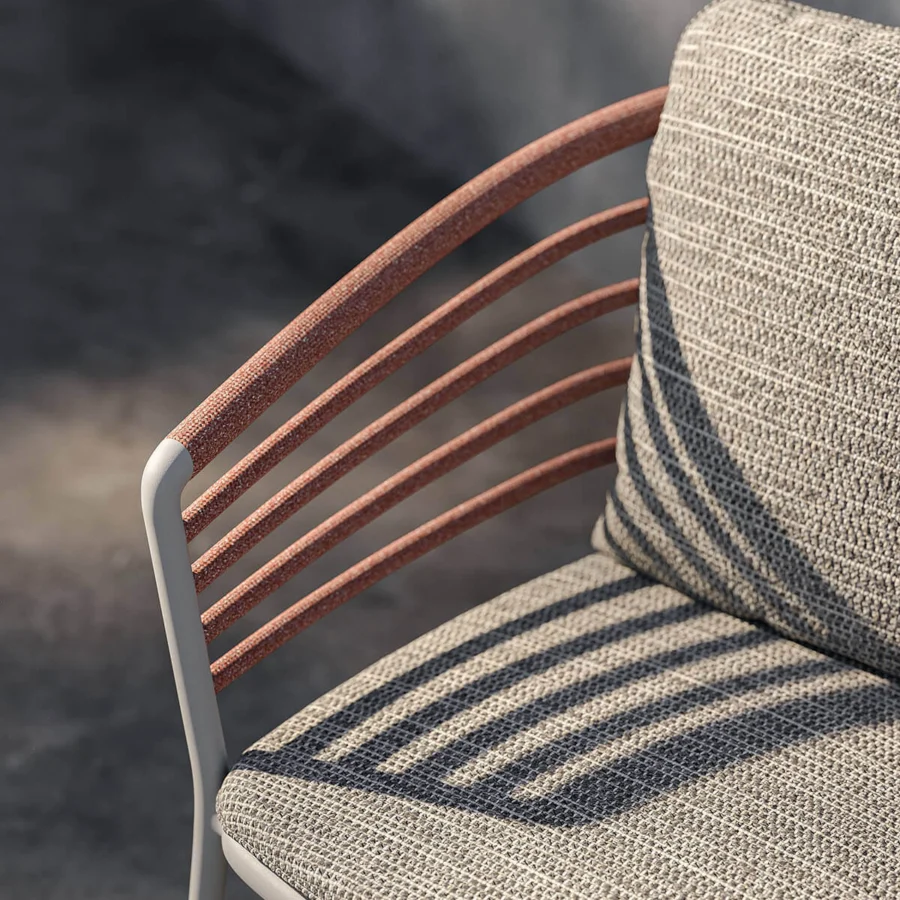 Distinguished Royal Botania Archy armchair with a satin metal frame and neutral gray Batyline seat built with reddish-brown wrappings