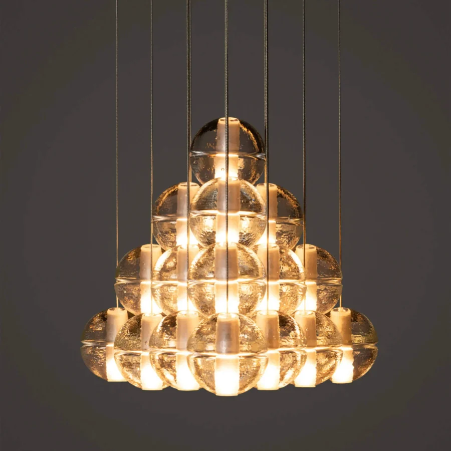 Distinguished Bocci 14 Geometric suspension lamp crafted in layered transparent glass exhibiting amber and golden tones with a coaxial cable system