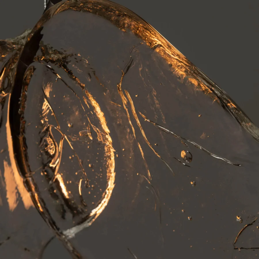 Distinguished Bocci 141 Random suspension lamp crafted with hand-blown glass containing amber inclusions and glossy finish