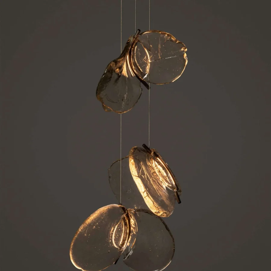 Captivating Bocci 141 Random suspension lamp with hand-blown glass pendants and nearly invisible coaxial cable system offering a warm amber glow