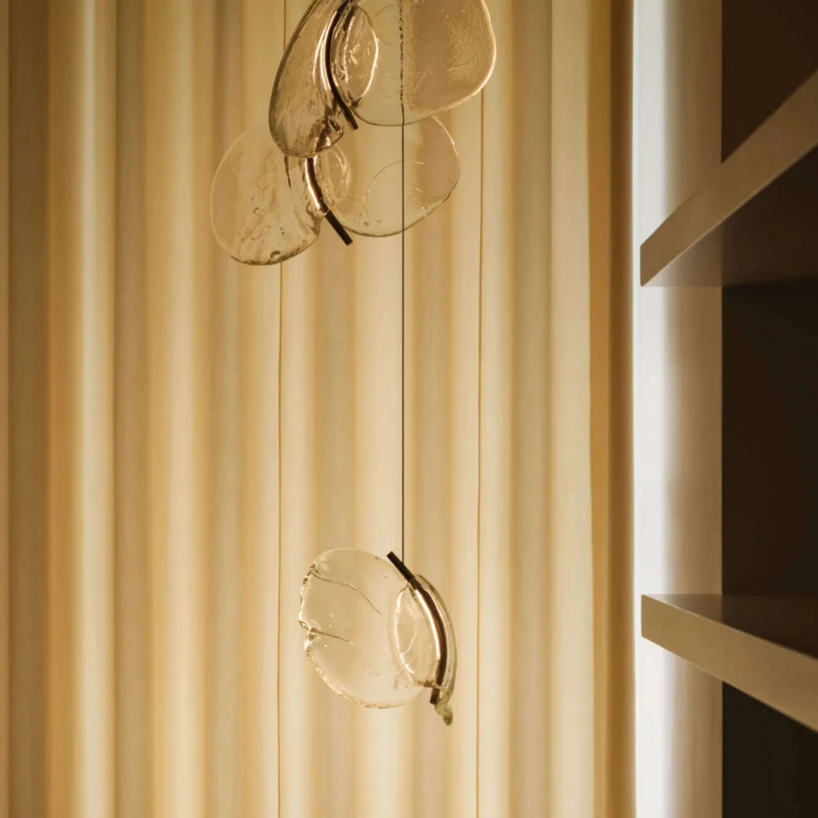 Superior Bocci 141 Random suspension lamp with hand-blown glass pendants and dark metallic rings crafted in warm amber tones