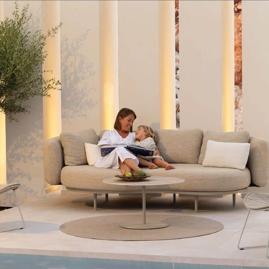 Distinguished Royal Botania Ostrea lounge chair crafted with light beige textile and pebble finished coated stainless steel