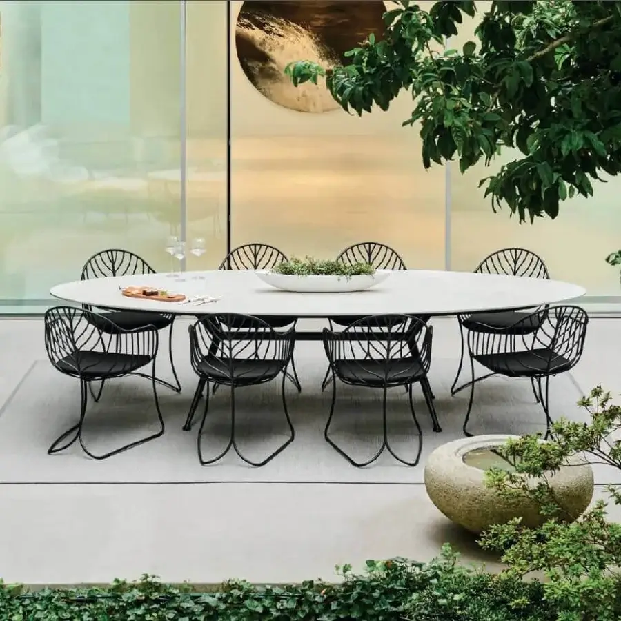 Distinctive Royal Botania Folia armchair with matte black metal and black cushioned seat exhibiting sculptural design inspiration