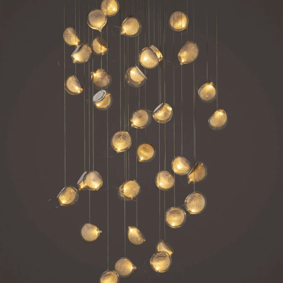 Exceptional Bocci 76 Random suspension lamp crafted in hot white and clear glass with delicate copper mesh detailing and white powder-coated canopy