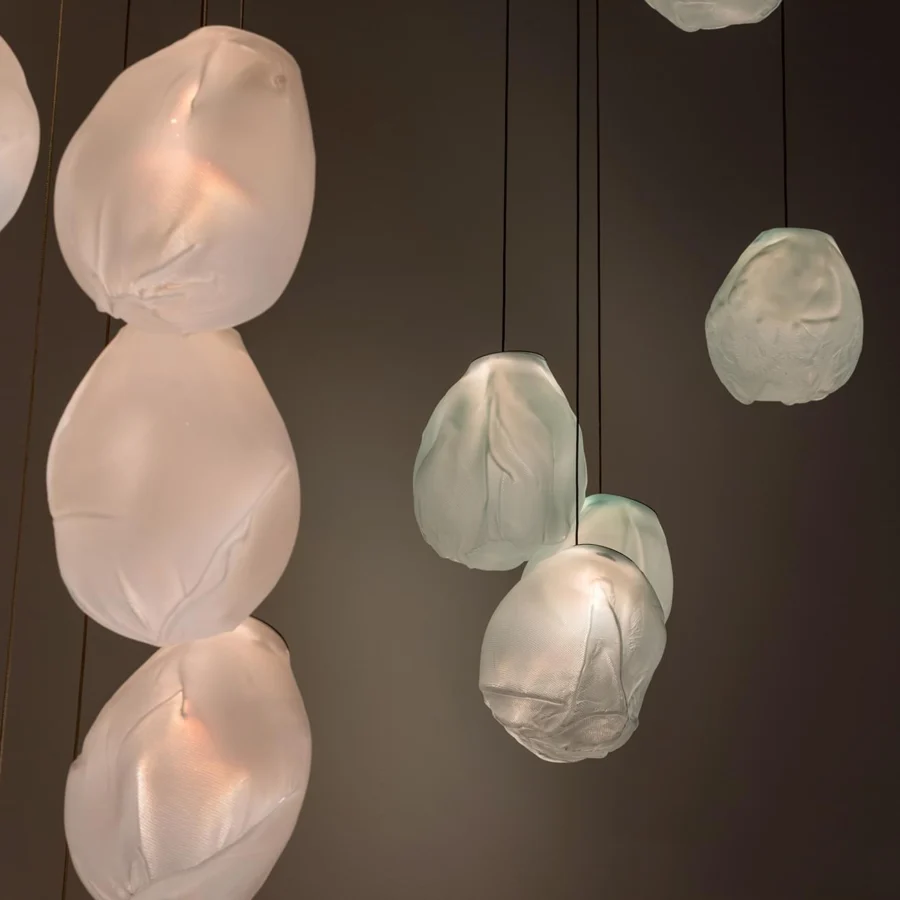 Exceptional Bocci 73V lamp suspension crafted with translucent matte white glass diffusers and braided metal cables