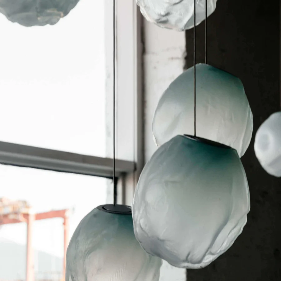 Distinguished Bocci 73V suspension lamp with organically shaped frosted glass in pale blue-green and braided metal coaxial cable