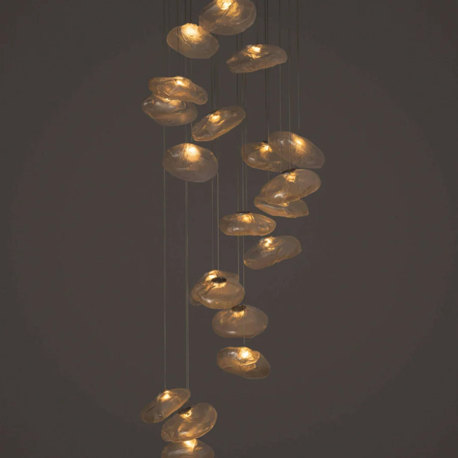 Luxury Bocci 73 suspension lamp with hand-blown glass pendants nestled within folded ceramic fabric vessels and dark metal cables