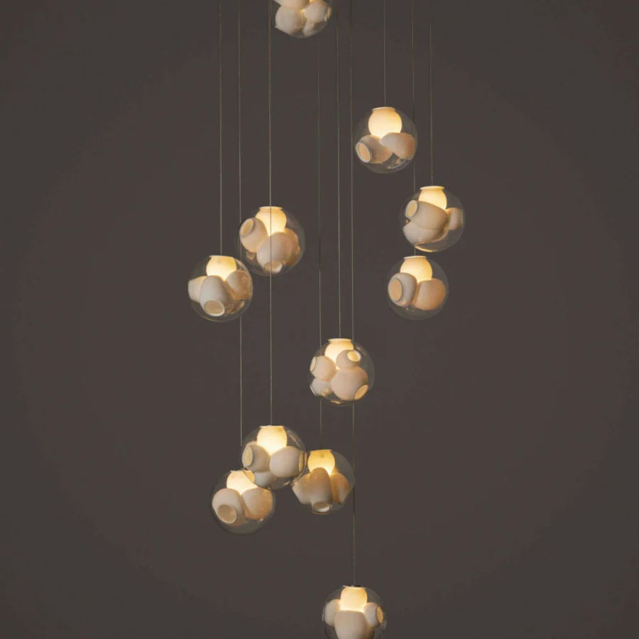 Captivating Bocci 38V Suspension Lamp lighting with twelve clear glass exterior spheres and milk white interior cavities
