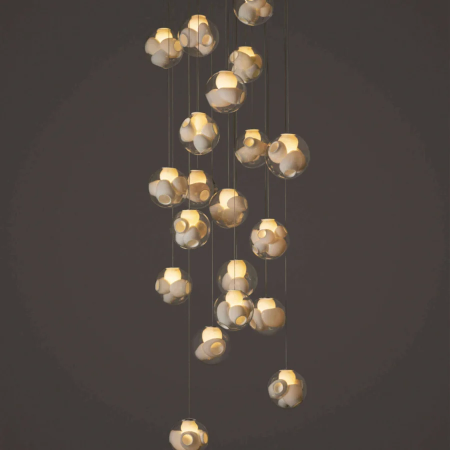 Exceptional Bocci 38V Suspension Lamp lighting with clustered clear glass spheres and milk white interior cavities crafted with dark coaxial cables