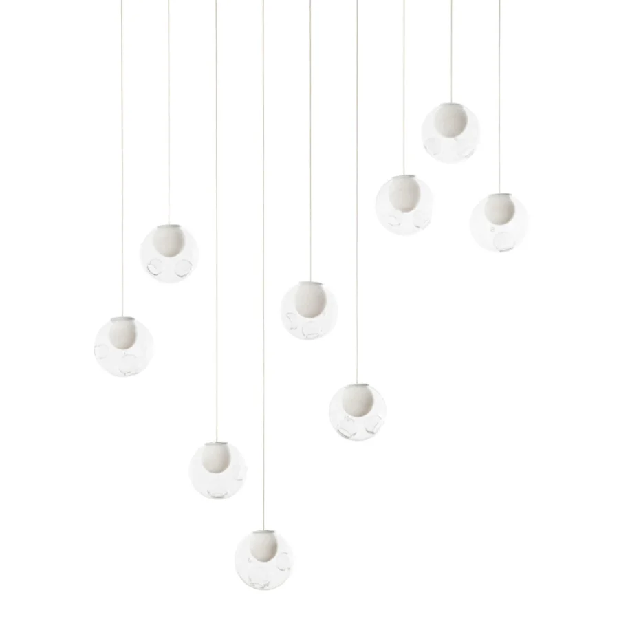 Exceptional Bocci 28 Linear suspension lamp crafted in clear glass with milk white interior lamp holder cavities and delicate cords