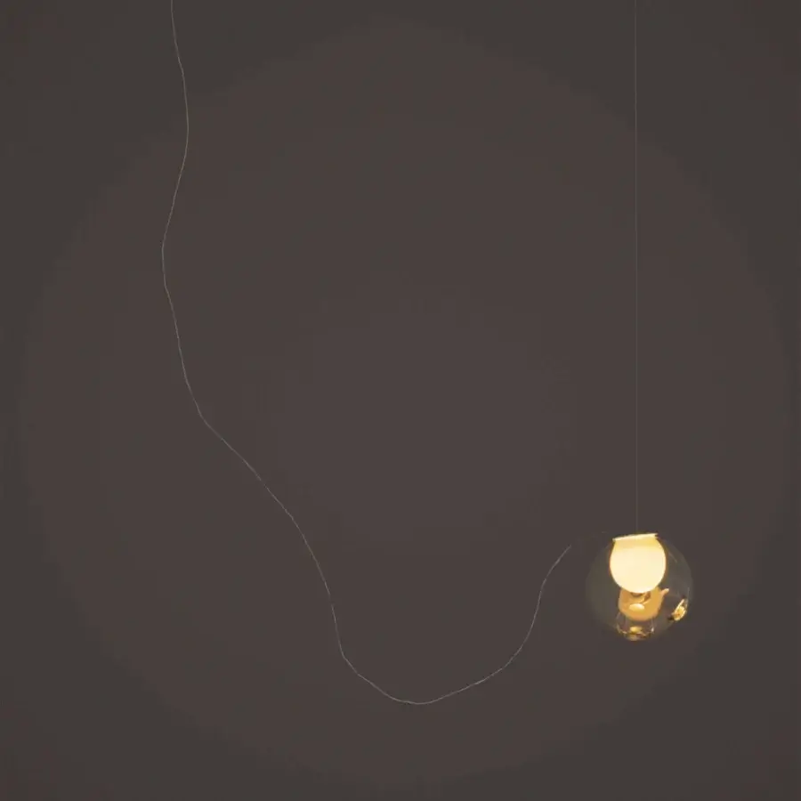 Distinguished Bocci 28 single sculptural lamp with clear glass exterior and milk white interior finish